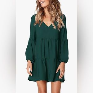 Size medium . Loose fit. Dark green tunic dress.